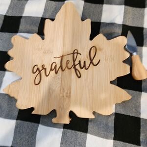 Leaf shaped wood charcuterie board and serving knife